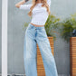 high-rise distressed slouchy horseshoe jeans