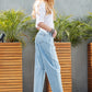 high-rise distressed slouchy horseshoe jeans